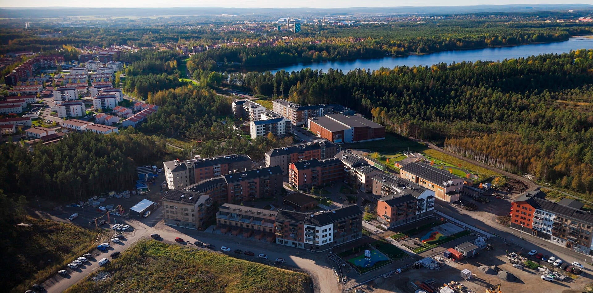 Nyproduktion Tomtebo gård - flygbild över grannskapet Glöd (visualisering)