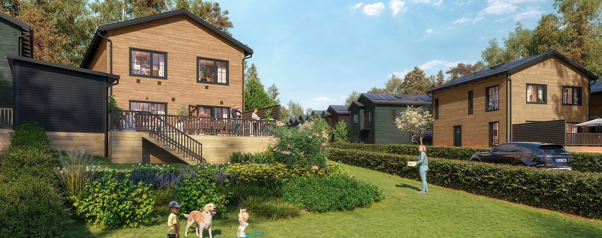 Nyproduktion Öjersjö - Visualisering av hus med en trädgård där barn leker med en hund